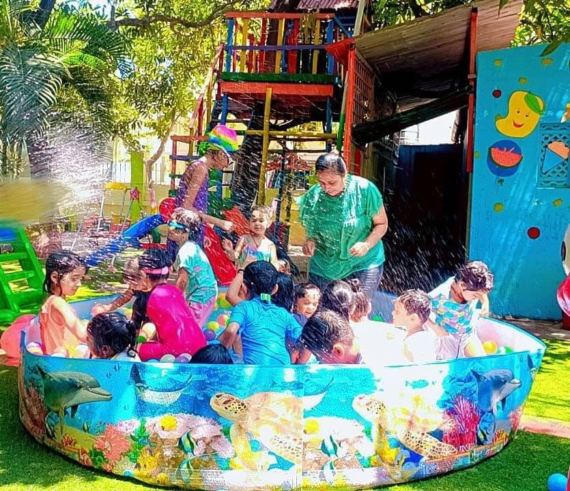 A vibrant scene of children enjoying a beach party at summer camp with swimming costumes and beach accessories.